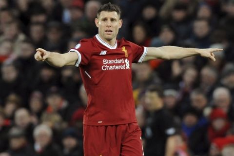 Liverpool's James Milner during the English Premier League soccer match between Liverpool and Tottenham Hotspur at Anfield in Liverpool, England, Sunday, Feb. 4, 2018. (AP Photo/Rui Vieira)