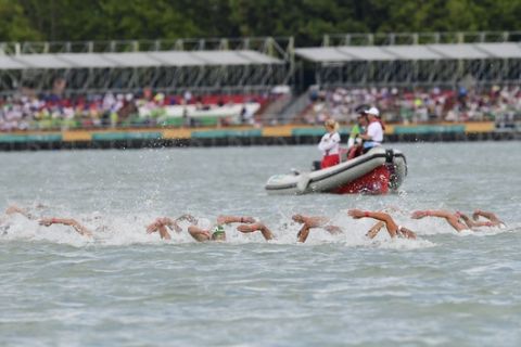 Swimmers compete in the men's open water 5km final of FINA Swimming World Championships 2017 in Balatonfured, 124 kms southwest of Budapest, Hungary, Saturday, July 15, 2017. (Zsolt Szigetvary/MTI via AP)