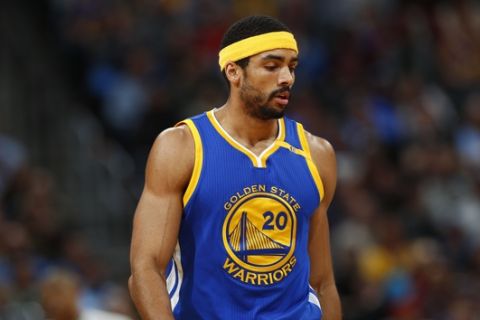 Golden State Warriors forward James Michael McAdoo (20) in the second half of an NBA basketball game Monday, Feb. 13, 201, in Denver. The Nuggets won 132-110. (AP Photo/David Zalubowski)