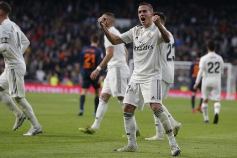 Real Madrid's Lucas Vazquez celebrates after scoring his side's 2nd goal during a Spanish La Liga soccer match between Real Madrid and Valencia at the Santiago Bernabeu stadium in Madrid, Spain, Saturday, Dec. 1, 2018. (AP Photo/Paul White)
