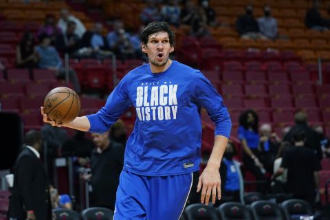 Dallas Mavericks center Boban Marjanovic warms up before the start of an NBA basketball game against the Miami Heat, Tuesday, Feb. 15, 2022, in Miami. (AP Photo/Wilfredo Lee)