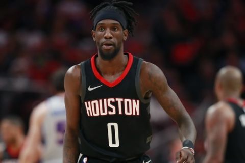 Houston Rockets guard Briante Weber (0) walks up court during the second half of an NBA basketball game against the Detroit Pistons, Saturday, Jan. 6, 2018, in Detroit. (AP Photo/Carlos Osorio)