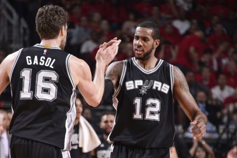 HOUSTON, TX - MAY 5:  LaMarcus Aldridge #12 and Pau Gasol #16 of the San Antonio Spurs celebrate during Game Three of the Western Conference Semifinals of the 2017 NBA Playoffson May 5, 2017 at the Toyota Center in Houston, Texas. NOTE TO USER: User expressly acknowledges and agrees that, by downloading and/or using this photograph, user is consenting to the terms and conditions of the Getty Images License Agreement. Mandatory Copyright Notice: Copyright 2017 NBAE (Photo by Bill Baptist/NBAE via Getty Images)