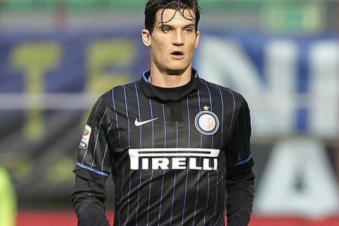 Inter Milan's Marco Andreolli controls the ball during the Serie A soccer match between Inter Milan and Genoa at the San Siro stadium in Milan, Italy, Sunday, Jan. 11, 2015. (AP Photo/Antonio Calanni)