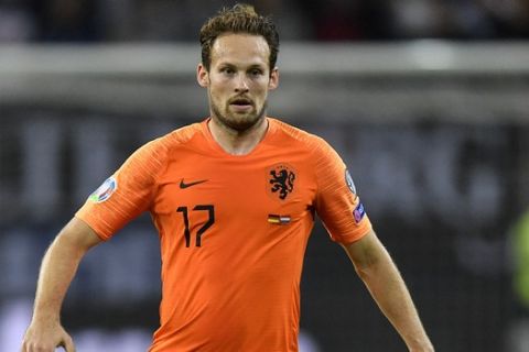 Netherland's Daley Blind plays during the Euro 2020 group C qualifying soccer match between Germany and The Netherlands in Hamburg, Germany, Friday Sept. 6, 2019. (AP Photo/Martin Meissner)