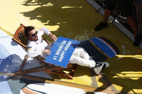 Hungaroring, Budapest, Hungary. .
Sunday 30 July 2017.
Fernando Alonso, McLaren, relaxes in a deck chair in parc ferme after finishing sixth.
Photo: Andrew Hone/McLaren
ref: Digital Image _ONZ1083
