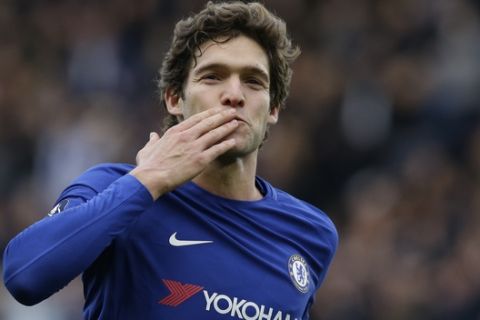 Chelsea's Marcos Alonso celebrates after scoring his side's third goal during the English FA Cup fourth round soccer match between Chelsea and Newcastle United at Stamford Bridge stadium in London, Sunday, Jan. 28, 2018 . (AP Photo/Alastair Grant)