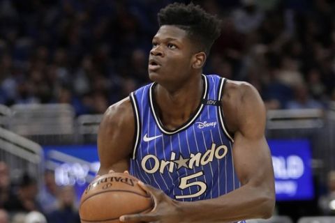 Orlando Magic's Mo Bamba (5) looks to take a shot against the Indiana Pacers during the second half of an NBA basketball game, Friday, Dec. 7, 2018, in Orlando, Fla. (AP Photo/John Raoux)