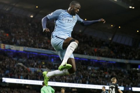 Manchester City's Yaya Toure celebrates scoring against West Bromwich Albion during the English Premier League soccer match at the Etihad Stadium, Manchester, England, Tuesday May 16, 2017. (Martin Rickett/PA via AP)