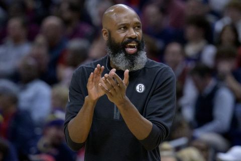 Brooklyn Nets coach Jacque Vaughn applauds the first half of the team's NBA basketball game against the New Orleans Pelicans in New Orleans, Friday, Jan. 6, 2023. (AP Photo/Matthew Hinton)