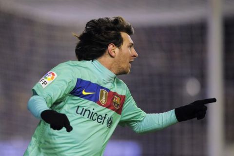 PAMPLONA, SPAIN - DECEMBER 04:  Lionel Messi of FC Barcelona celebrates after scoring the second goal during the la Liga match between CA Osasuna and Barcelona at Estadio Reyno de Navarra on December 4, 2010 in Pamplona, Spain.  (Photo by David Ramos/Getty Images)
