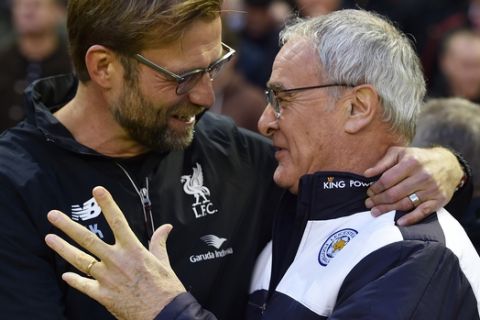 LIVERPOOL, ENGLAND - DECEMBER 26:  (THE SUN OUT, THE SUN ON SUNDAY OUT) Jurgen Klopp manager of Liverpool and Claudio Ranieri manager of Leicester City share a laugh and shake hands before the Barclays Premier League match between Liverpool and Leicester City at Anfield on December 26, 2015 in Liverpool, England.  (Photo by John Powell/Liverpool FC via Getty Images)