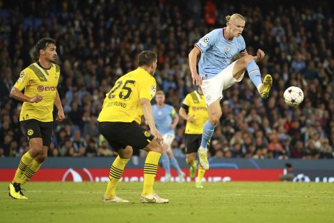 Manchester City's Erling Haaland control the ball during the group G Champions League soccer match between Manchester City and Borussia Dortmund at the Etihad stadium in Manchester, England, Wednesday, Sept. 14, 2022. (AP Photo/Dave Thompson)
