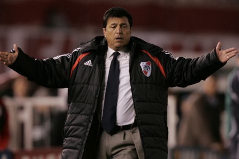 FILE- In this Nov. 14, 2007 file photo, Argentina's River Plate's coach Daniel Passarella gestures during a Copa Sudamericana semifinal soccer game in Buenos Aires, Argentina. The sports newspaper Ole publish on Wednesday, April 23, 2014, that the River Plate club filed a criminal complaint against the former coach and club president for alleged mismanagement during his four years leading the club. (AP Photo/ Natacha Pisarenko, File)
