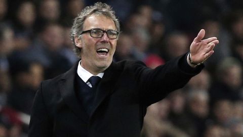 FILE - In this March 20, 2016 file photo, PSG headcoach Laurent Blanc gestures during his French League One soccer match against Monaco, at the Parc des Princes stadium, in Paris. Paris Saint-Germain says Monday June 27, 2016  it has parted company with coach Laurent Blanc. PSG made his departure official in a statement. It said talks led to an agreement, signed Monday, that preserves the interests of both Blanc and the club. (AP Photo/Thibault Camus)