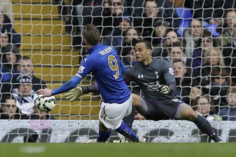 Leicesters Jamie Vardy scores a goal past Tottenham goalkeeper Michel Vorm during the English Premier League soccer match between Tottenham and Leicester City at White Hart Lane, London, Saturday, March 21, 2015. (AP Photo/Tim Ireland)