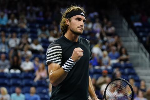 Stefanos Tsitsipas, of Greece, reacts during a match against Milos Raonic, of Canada, at the first round of the U.S. Open tennis championships, Monday, Aug. 28, 2023, in New York. (AP Photo/Frank Franklin II)