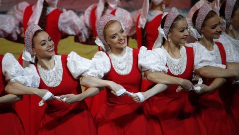 Dancers perform during the 2018 soccer World Cup draw in the Kremlin in Moscow, Friday Dec. 1, 2017. (AP Photo/Pavel Golovkin)