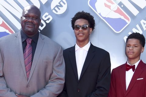 Shaquille O'Neal, from left, and his sons Shareef O'Neal and Shaqir O'Neal arrive at the NBA Awards on Monday, June 25, 2018, at the Barker Hangar in Santa Monica, Calif. (Photo by Richard Shotwell/Invision/AP)