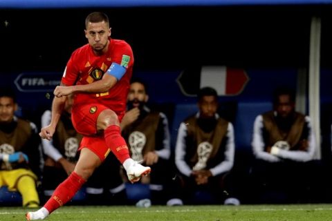 Belgium's Eden Hazard kicks the ball during the semifinal match between France and Belgium at the 2018 soccer World Cup in the St. Petersburg Stadium, in St. Petersburg, Russia, Tuesday, July 10, 2018. (AP Photo/Petr David Josek)