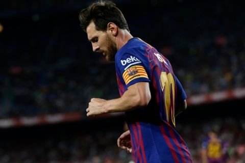 FC Barcelona's Lionel Messi looks down during the Spanish La Liga soccer match between FC Barcelona and Alaves at the Camp Nou stadium in Barcelona, Spain, Saturday, Aug. 18, 2018. (AP Photo/Manu Fernandez)
