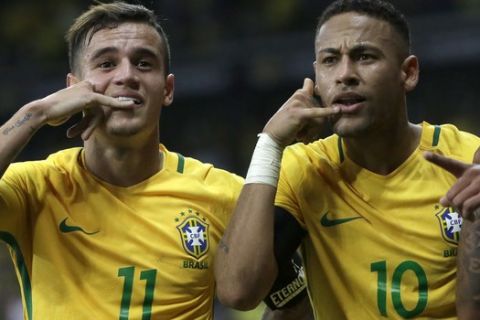 Brazil's Neymar, center, celebrates with teammates Philippe Coutinho, left, and Gabriel Jesus after scoring his side's second goal against Argentina during a 2018 World Cup qualifying soccer match at the Estadio Mineirao in Belo Horizonte, Brazil, Thursday Nov. 10, 2016.(AP Photo/Leo Correa)