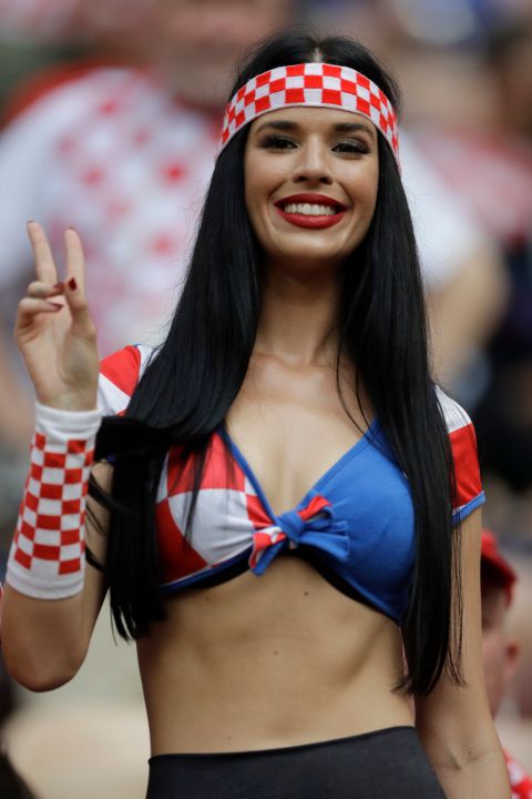 A fan of Croatia waits for the start of the final match between France and Croatia at the 2018 soccer World Cup in the Luzhniki Stadium in Moscow, Russia, Sunday, July 15, 2018. (AP Photo/Natacha Pisarenko)