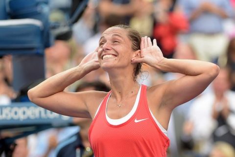 September 11, 2015 - Roberta Vinci celebrates her win over Serena Williams in a women's singles semifinal match during the 2015 US Open at the USTA Billie Jean King National Tennis Center in Flushing, NY. (USTA/Pete Staples)