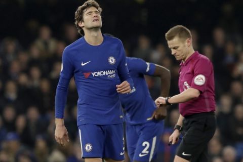 Chelsea's Marcos Alonso reacts after failing to score a freekick in the final minutes of the English Premier League soccer match between Chelsea and Leicester City at Stamford Bridge stadium in London, Saturday, Jan. 13, 2018. (AP Photo/Matt Dunham)