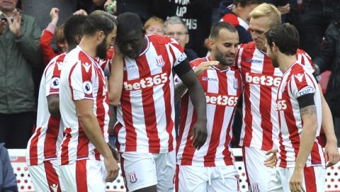 Stoke's Jese, 3rd right, celebrates with team mates after scoring during the English Premier League soccer match between Stoke City and Arsenal at the Bet365 Stadium in Stoke on Trent, England, Saturday, Aug. 19, 2017. (AP Photo/Rui Vieira)