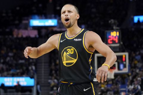 Golden State Warriors guard Stephen Curry gestures toward fans during the second half of Game 1 of the team's NBA basketball first-round playoff series against the Denver Nuggets in San Francisco, Saturday, April 16, 2022. (AP Photo/Jeff Chiu)