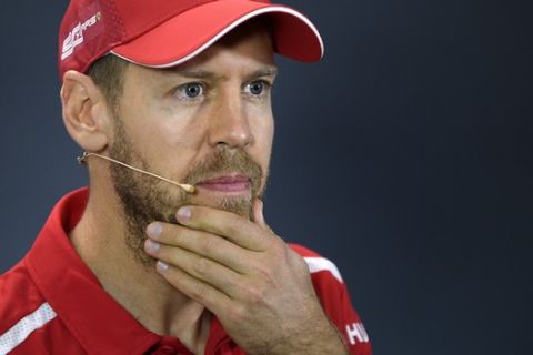 Ferrari driver Sebastian Vettel of Germany answers a question during the drivers press conference ahead of the Australian Formula One Grand Prix in Melbourne, Australia, Thursday, March 14, 2019. The season-opening Australian Grand Prix will be raced here on Sunday, March 17. (AP Photo/Andy Brownbill)