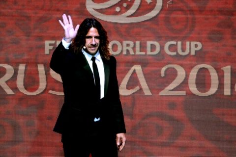 Former Spanish soccer international Carles Puyol arrives at the 2018 soccer World Cup draw in the Kremlin in Moscow, Friday, Dec. 1, 2017. (AP Photo/Ivan Sekretarev)
