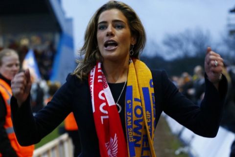 Mansfield Town's CEO Carolyn Radford gestures as she arrives for their FA Cup third round soccer match against Liverpool at Field Mill in Mansfield, central England, January 6, 2013. REUTERS/Darren Staples   (BRITAIN - Tags: SPORT SOCCER)