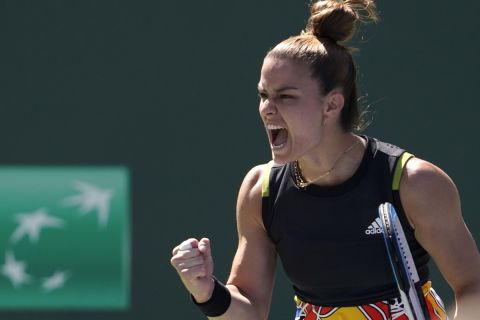Maria Sakkari, of Greece, reacts during the women's singles finals against Iga Swiatek, of Poland, at the BNP Paribas Open tennis tournament Sunday, March 20, 2022, in Indian Wells, Calif. (AP Photo/Mark J. Terrill)