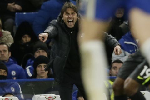 Chelsea manager Antonio Conte shouts instructions during the English Premier League soccer match between Chelsea and Brighton & Hove Albion at Stamford Bridge in London, Tuesday Dec. 26, 2017. (AP Photo/Tim Ireland)