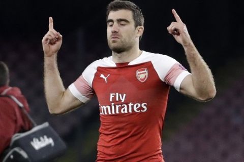 Arsenal's Sokratis Papastathopoulos reacts after the Europa League second leg quarterfinal soccer match between Napoli and Arsenal at San Paolo stadium in Naples, Italy, Thursday, April 18, 2019. Arsenal won 1-0.(AP Photo/Luca Bruno)