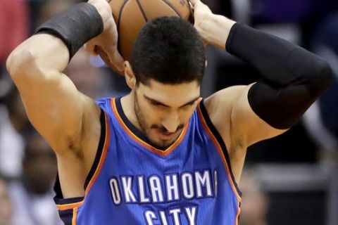 Oklahoma City Thunder center Enes Kanter reacts to a foul called against him during the first half of the team's NBA basketball game against the Phoenix Suns, Friday, March 3, 2017, in Phoenix. (AP Photo/Matt York)