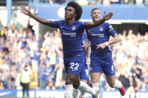 Chelsea's Willian celebrates scoring his sides 4th goal of the game during their English Premier League soccer match between Chelsea and Cardiff City at Stamford Bridge stadium in London Saturday, Sept. 15, 2018. (AP Photo/Alastair Grant)