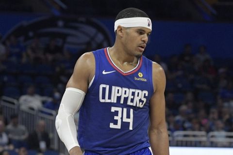 Los Angeles Clippers forward Tobias Harris (34) sets up on the court during the second half of an NBA basketball game against the Orlando Magic Friday, Nov. 2, 2018, in Orlando, Fla. The Clippers won 120-95. (AP Photo/Phelan M. Ebenhack)