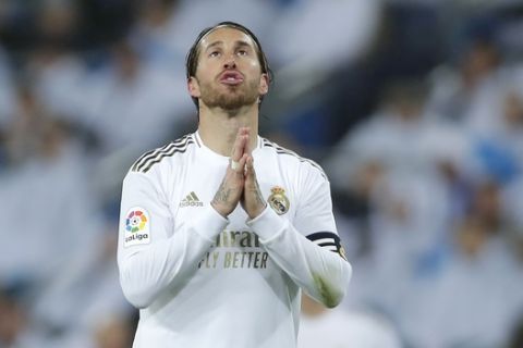 Real Madrid's Sergio Ramos reacts during the Spanish La Liga soccer match between Real Madrid and Barcelona at the Santiago Bernabeu stadium in Madrid, Spain, Sunday, March 1, 2020. (AP Photo/Manu Fernandez)