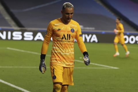 PSG's goalkeeper Keylor Navas leaves the pitch after an injuring during the Champions League quarter-final soccer match between Atalanta and Paris Saint-Germain, at the Luz stadium in Lisbon, Portugal, Wednesday, Aug. 12, 2020. (Rafael Marchante/Pool via AP)