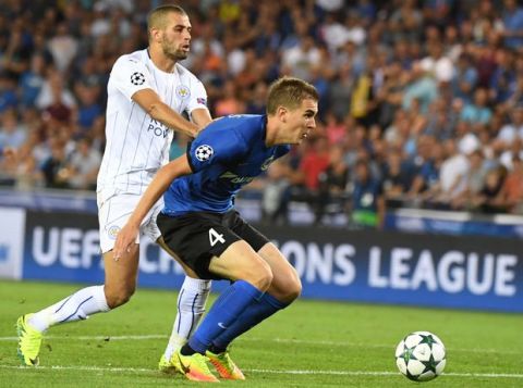 Brugge's Bjorn Engels, right, is challenged by Leicester's Islam Slimani during the Champions League Group G soccer match between Club Brugge and Leicester at the Jan Breydel stadium in Brugge, Belgium on Wednesday, Sept. 14, 2016. (AP Photo/Geert Vanden Wijngaert)