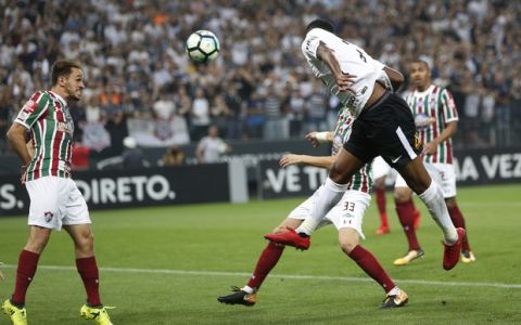 Corinthians' Jo scores his second goal against Fluminense during a Brasileirao championship soccer match in Sao Paulo, Brazil, Wednesday, Nov. 15, 2017. Corinthians' 3-1 victory over Fluminense won them the championship title. (AP Photo/Andre Penner)