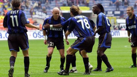 Internazionale of Milan Greek defender Grigorios Georgatos, second from left, celebrates with teammates after scoring during an Italian first division match between Inter and Bologna at the San Siro stadium in Milan, Italy, Sunday, Sept. 30, 2001. Inter won 1-0. (AP Photo/Antonio Calanni)         