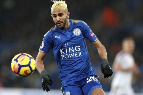 Leicester City's Riyad Mahrez in action during the English Premier League soccer match between Leicester City and Burnley FC at the King Power Stadium. Leicester, England. Saturday. Dec. 2, 2017. (Mike Egerton/PA via AP)