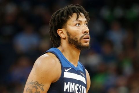Minnesota Timberwolves' Derrick Rose plays against the Houston Rockets during the second half of Game 4 in an NBA basketball first-round playoff series Monday, April 23, 2018, in Minneapolis. (AP Photo/Jim Mone)