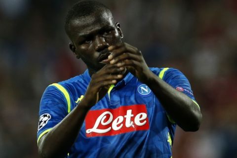 Napoli defender Kalidou Koulibaly applauds supporters after the Champions League group C soccer match between Red Star and Napoli, in Belgrade, Serbia, Tuesday, Sept. 18, 2018. (AP Photo/Darko Vojinovic)