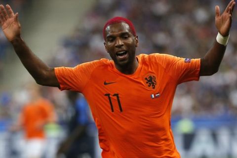 Netherlands Ryan Babel reacts after failing to collect a pass during the UEFA Nations League soccer match between France and the Netherlands at the Stade De France in Paris, Sunday, Sept. 9, 2018. (AP Photo/Thibault Camus)