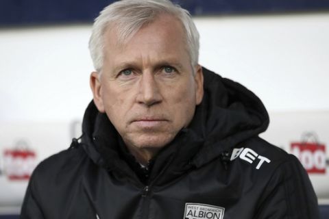 West Bromwich Albion manager Alan Pardew prior to the English Premier League soccer match against Manchester United at The Hawthorns, West Bromwich, England, Sunday Dec. 17, 2017. (Nick Potts/PA via AP)
